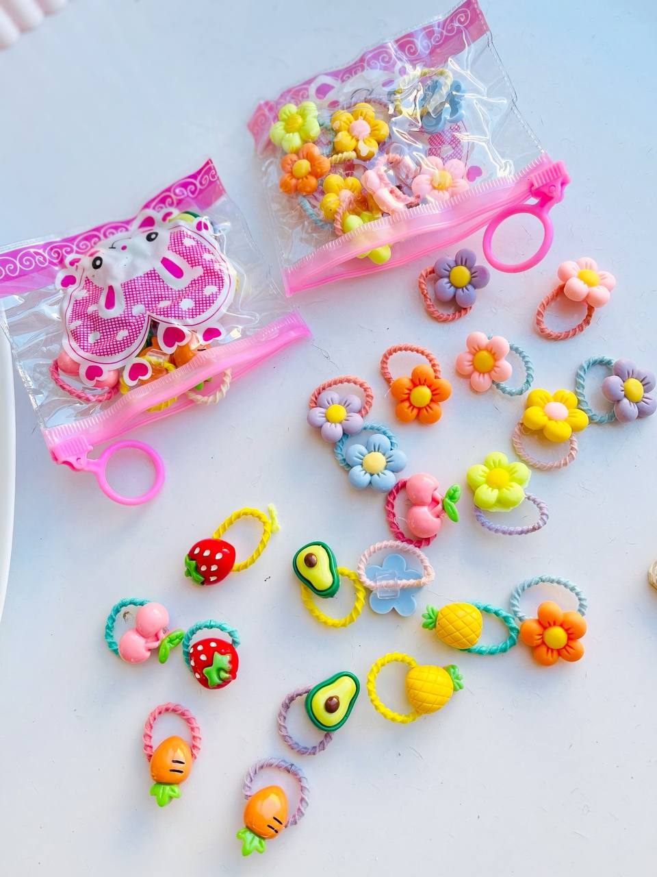 کش مو لیزری طرح گل پک 10 عددی کیف دار