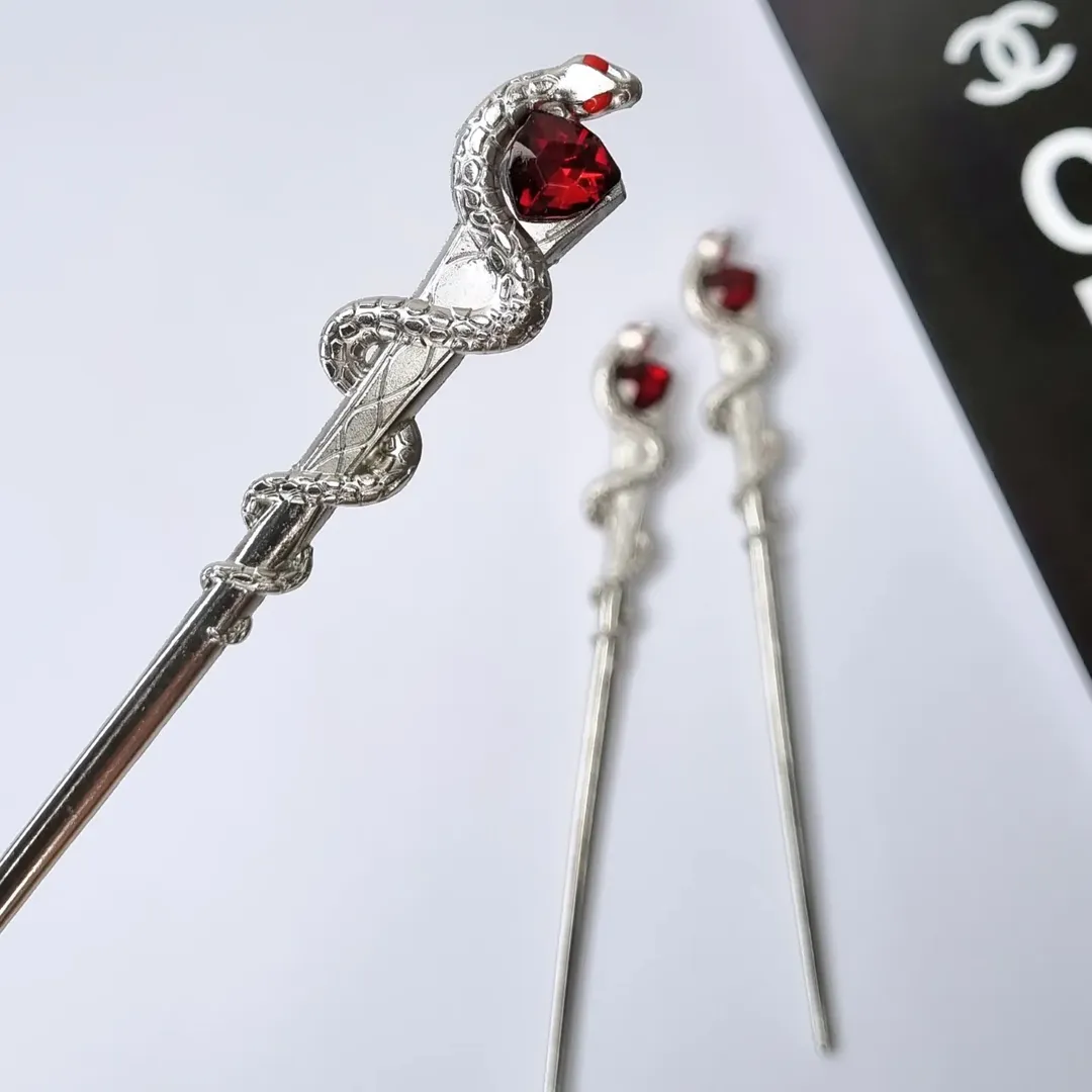 گیره مو کانزاشی فلزی طرح مار و یاقوت قرمز zaya