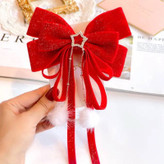 پاپیون مخمل دنبالهدار قرمز زنانه – اکسسوری شیک مخصوص کریسمس و شب یلدا